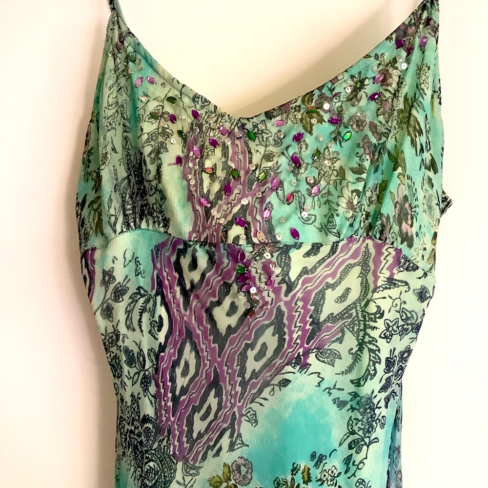 Aqua print gown with beading and beautiful flared hem peekaboo. Stunning colors.